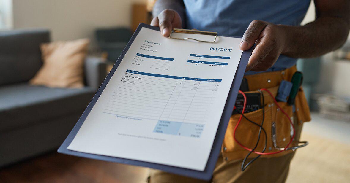 Homeowner dealing with emergency furnace repair during winter